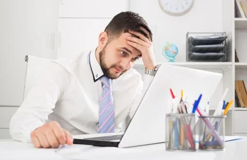 Man having problem in office Stock Photos