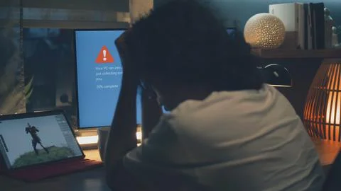 Man having problem with pc during work Stock Photos