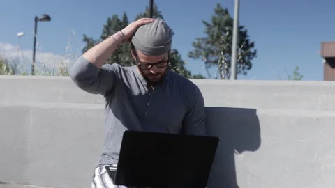Man having problems working on his laptop outdoor. Stress concept Stock Footage 131680907