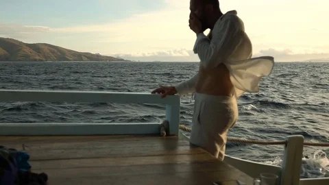 Man having seasickness while sailing on the boat, slow motion shot at 240fps, st Stock Footage 80415843