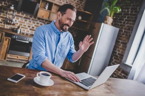 Man having video chat using laptop Stock Photos