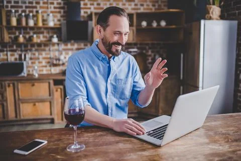Man having video chat using laptop Stock Photos