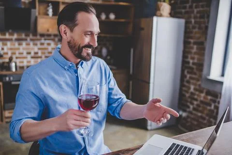 Man having video chat using laptop Stock Photos