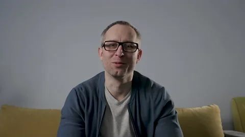 Man having a video conference call.  Stock Footage 187540407