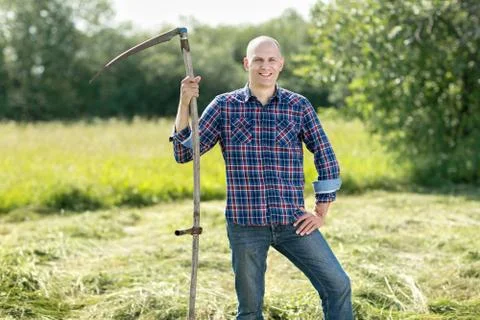 Man on  haymaking Stock Photos