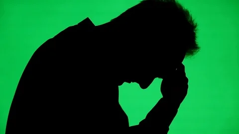 Man with Head Down on a Green Screen Stock Footage 104097801