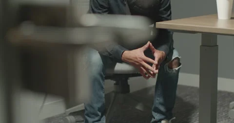 Man With Head Down In Police Interrogation Room. Waiting For Detectives Stock Footage 273177982