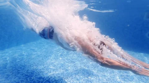 Man head jump in swimming pool, underwater view, slow motion Stock Footage 145242482