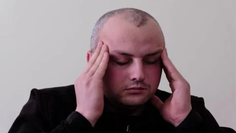 Man head massage migraine pain hurt person suffers headache face temple pain Stock Footage