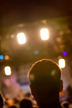 Man head silhouette with concert lights Stock Photos