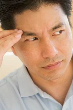 Man With A Headache Stock Photos