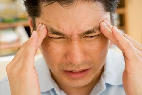 Man With A Headache Photos