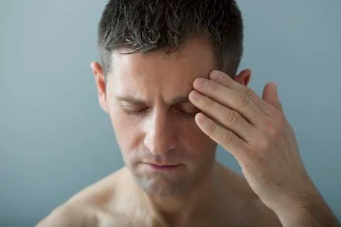Man with headache Stock Photos