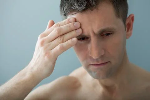 Man with headache Stock Photos