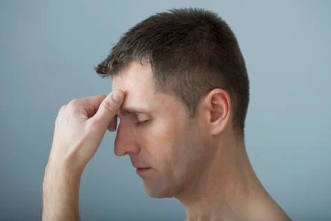 Man with headache Stock Photos
