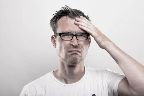 Man with headache Stock Photos