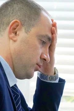 Man with a headache Stock Photos