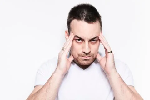 A man with a headache problem over white Stock Photos