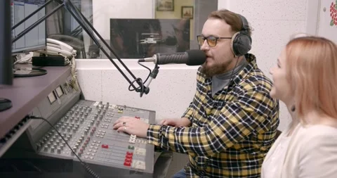 Man in headphones speak to microphone Stock Video Pond5