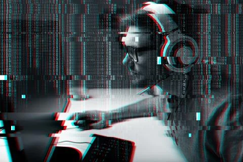 Man in headset playing computer video game at home Photos