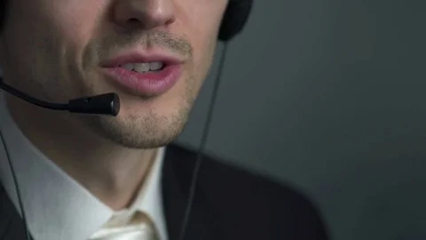 Man with headset working in a call centre Stock Footage 75962411