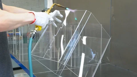 Man heating the plastic with the gas torch Stock Footage 119398271