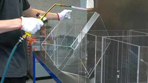 Man heating the plastic with the gas torch Stock Footage 119398285
