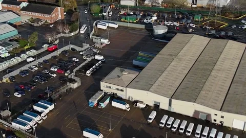 Man held after five people injured in suspected stabbing near Asda in Croydon Stock Footage 299842583