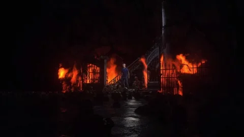 Man in hell. Sinner. A lonely sinfull man stands in front of a hell gates. Stock Footage 328547660