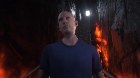 Man in hell. Sinner. A lonely sinfull man stands in front of a hell gates. Stock Footage 328547871