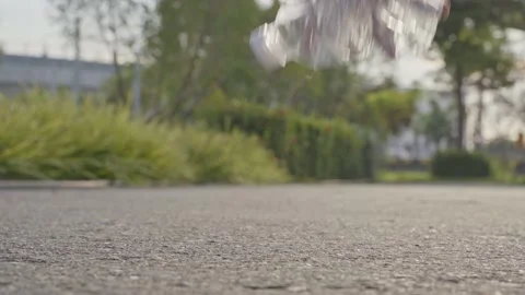 A man is helping to collect plastic bottles in the streets to keep the streets c Stock Footage 145178174
