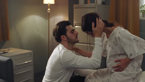 Man helping his wife while she is in pain Video stock 283069329