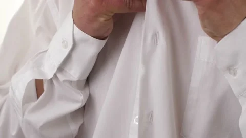 Man hide microphone under shirt 動画素材 139928895