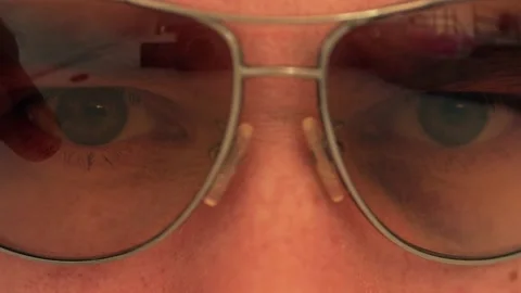 Man hides bruised eye with sunglasses. Violence or abuse concept Stock Footage 239437070