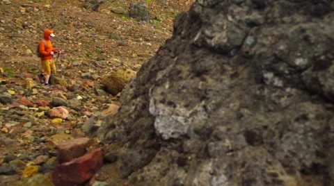 Man hikes among rocks Stock Footage 59522142