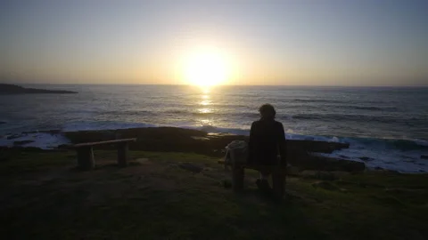 Man hiking close to big cliffs and heavy ocean in Basque Coast, Spain Video stock 154777159