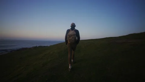Man hiking during in big cliffs in Basque Coast, Spain Stock-Footage 154777613