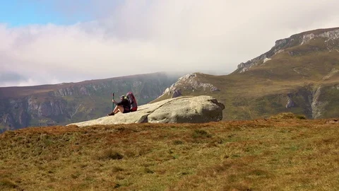 Man hiking high in the mountains Stock-Footage 95082644