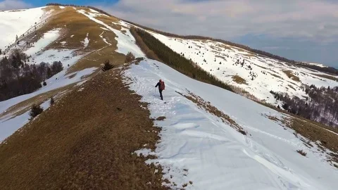 Man hiking on the mountain Stock Footage 75057721