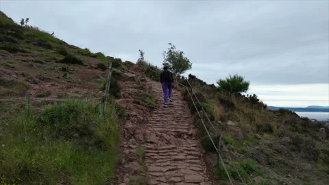 Man hiking mountain Stock Footage 280784158