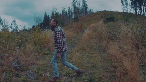 Man hiking in the mountain forest Video stock 82824878