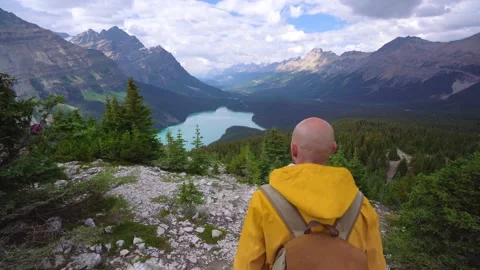 Man Hiking In Panoramic Mountain View Scenery Video stock 230011969
