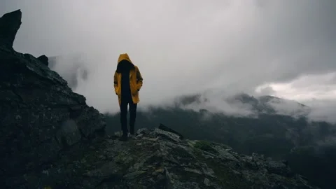Man Hiking In The Rain Stock Footage 230142774