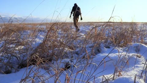 A Man Hiking In The Snow Stock Footage 218642769