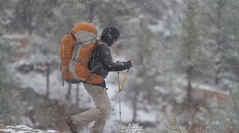 Man hiking in snow slow motion 動画素材 51028516