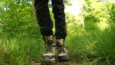 Man Hiking through Nature. Low Angle Boots Walking through Forest Woodland Stock Footage 111237150