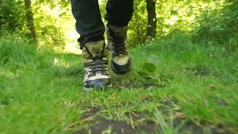 Man Hiking through Nature. Low Angle Boots Walking through Forest Woodland Stock Footage 111237230