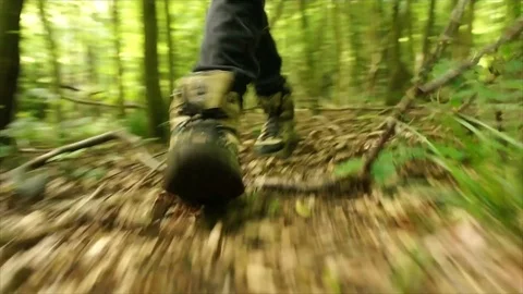 Man Hiking through Nature. Low Angle Boots Walking through Forest Woodland Stock Footage 111237333