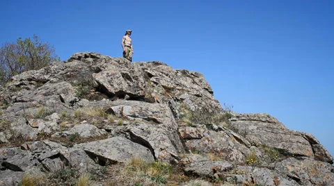 Man in the hills Stock Footage 37864076