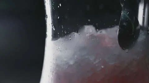 Man hinders the ice in the hookah Stock Footage 77346399